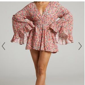 brand new long floral sleeve playsuit.